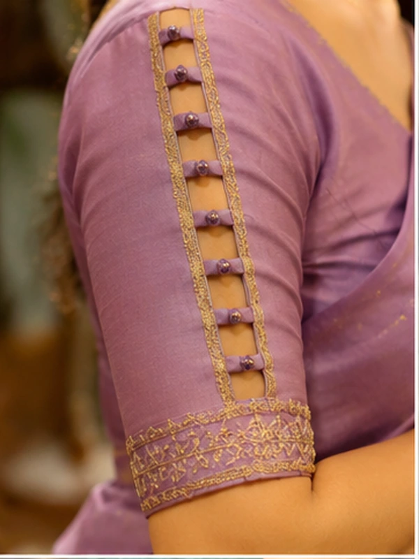 stylish blouse sleeve designs for sarees featuring puff, button, scalloped, pleated, criss-cross, bow, embroidered, and lace details.
