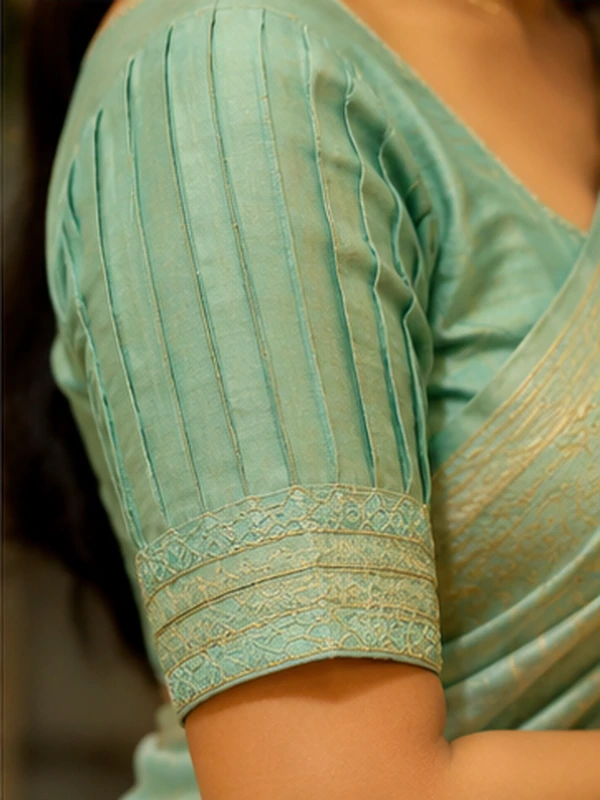stylish blouse sleeve designs for sarees featuring puff, button, scalloped, pleated, criss-cross, bow, embroidered, and lace details.