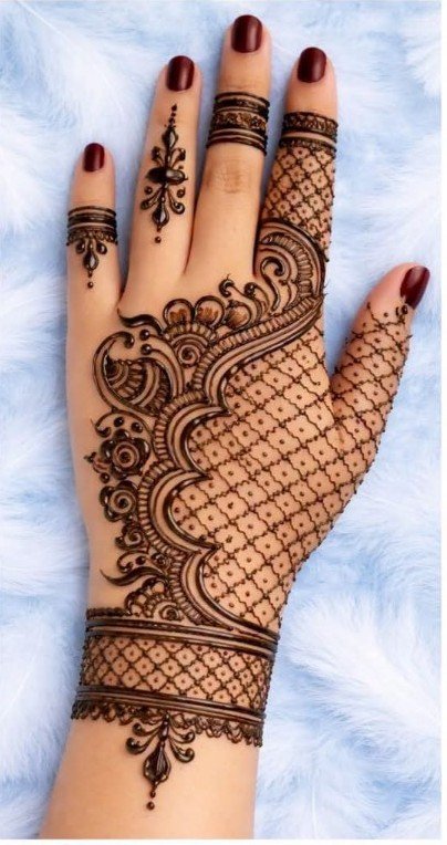 25 Latest Raksha Bandhan Mehndi Designs 2026 for Front & Back Hands 14 Latest Raksha Bandhan mehndi designs featuring simple back hand, Arabic, floral, mandala, bracelet, and full-hand henna patterns for women in 2026.