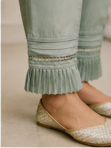 Trousers Designs: 9 Stylish Pant Mohri Designs for Women to Try in 2026 7 9 stylish pant mohri designs featuring scalloped lace, layered cutwork, pleated cuffs, diamond lace, V-cut pleats, pintuck lace, floral lace, and chevron cuts.