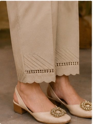 Trousers Designs: 9 Stylish Pant Mohri Designs for Women to Try in 2026 11 9 stylish pant mohri designs featuring scalloped lace, layered cutwork, pleated cuffs, diamond lace, V-cut pleats, pintuck lace, floral lace, and chevron cuts.