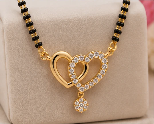 Mangalsutra Designs : 12 Latest Mangalsutra Designs for Women in 2026 13 Double Heart Pendant Design