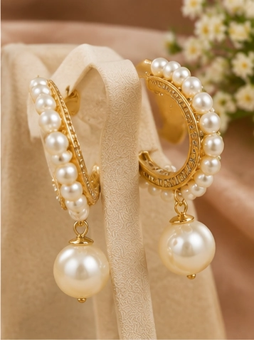 latest pearl earrings designs for women including pearl jhumkas, drop earrings, hoops and floral styles