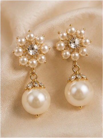 latest pearl earrings designs for women including pearl jhumkas, drop earrings, hoops and floral styles