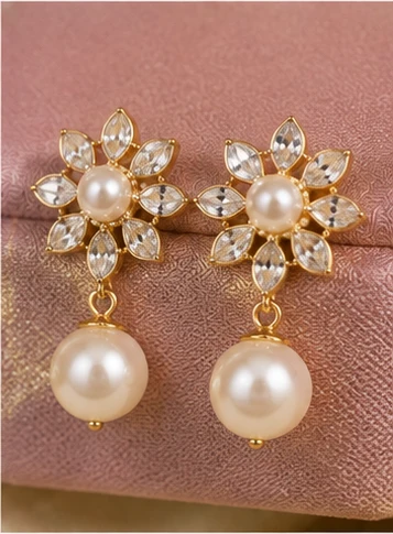 latest pearl earrings designs for women including pearl jhumkas, drop earrings, hoops and floral styles
